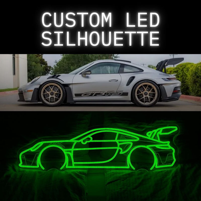 Glowing green LED silhouette of a Porsche 911 GT3 RS